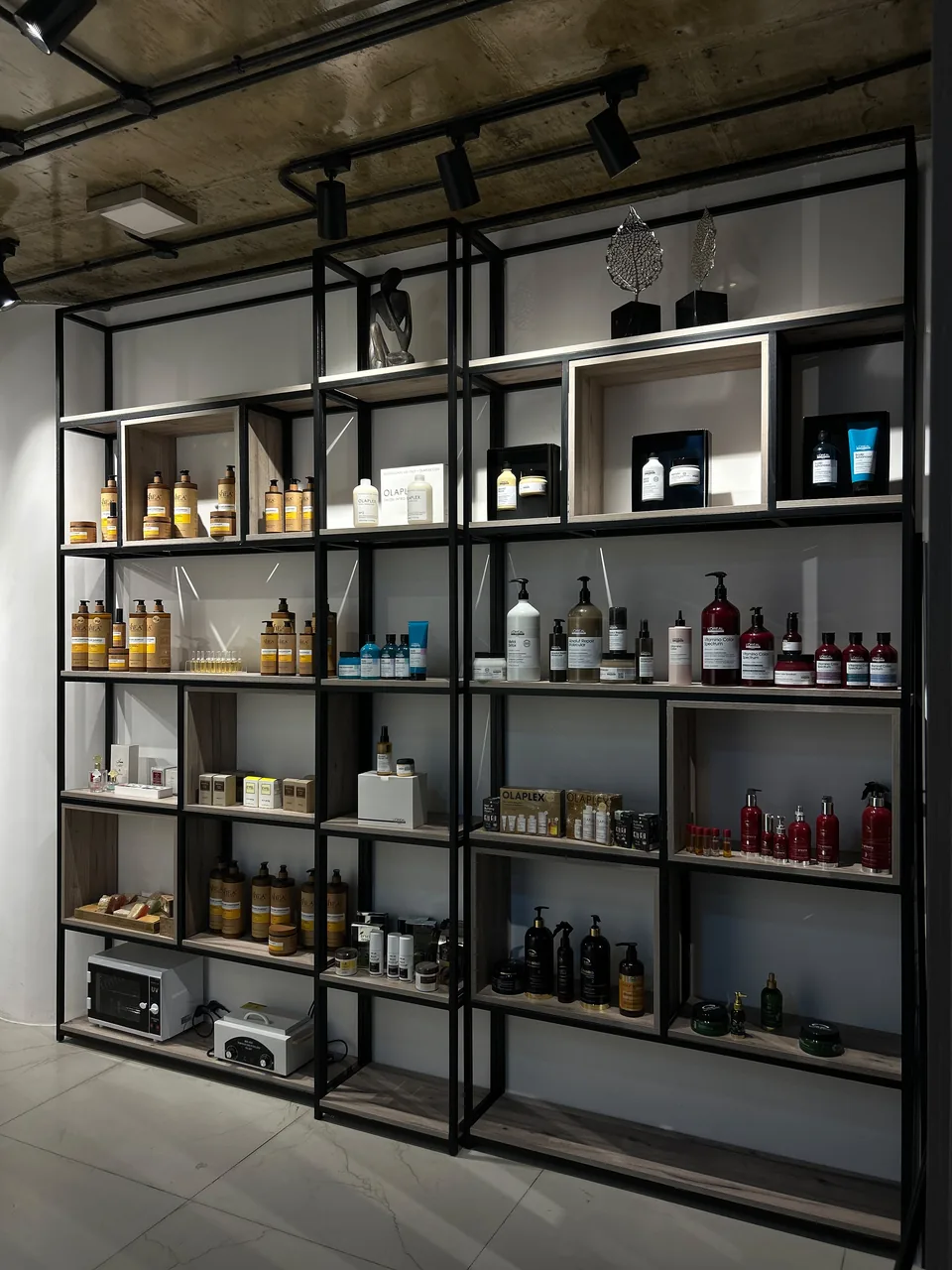 Professional hair products displayed inside The Beauty Spot by Samah